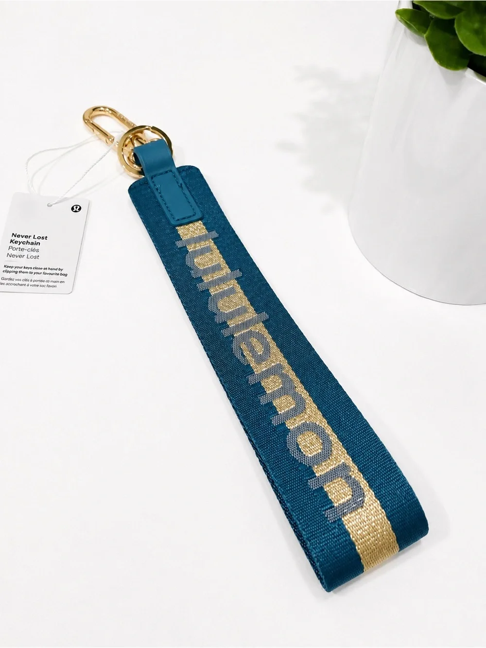 lululemon athletica Teal and Gold Never Lost Keychain Wristlet